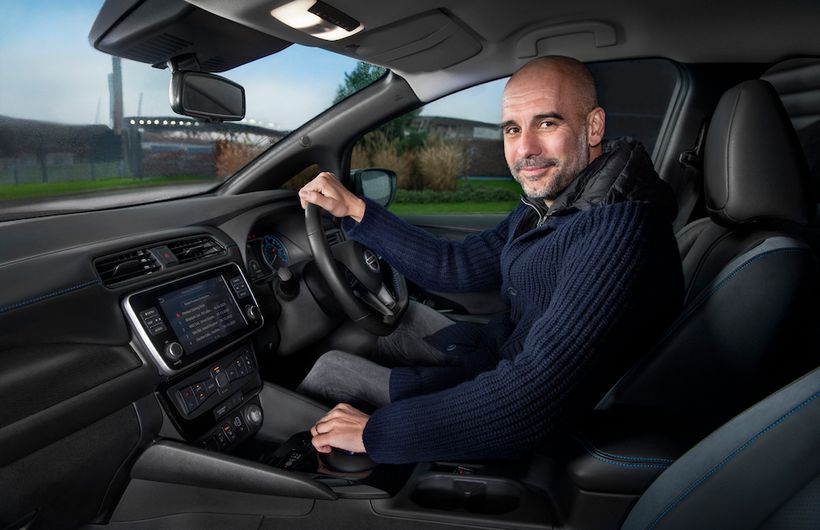 Pep Guardiola inside his Nissan LEAF